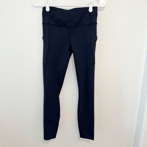 Athleta Pants - Athleta Navy Blue Laser Cut‎ Ventilated Running Leggings Pockets XS